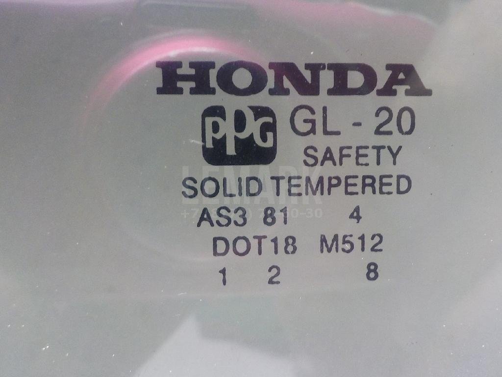 Стекло двери задней левой