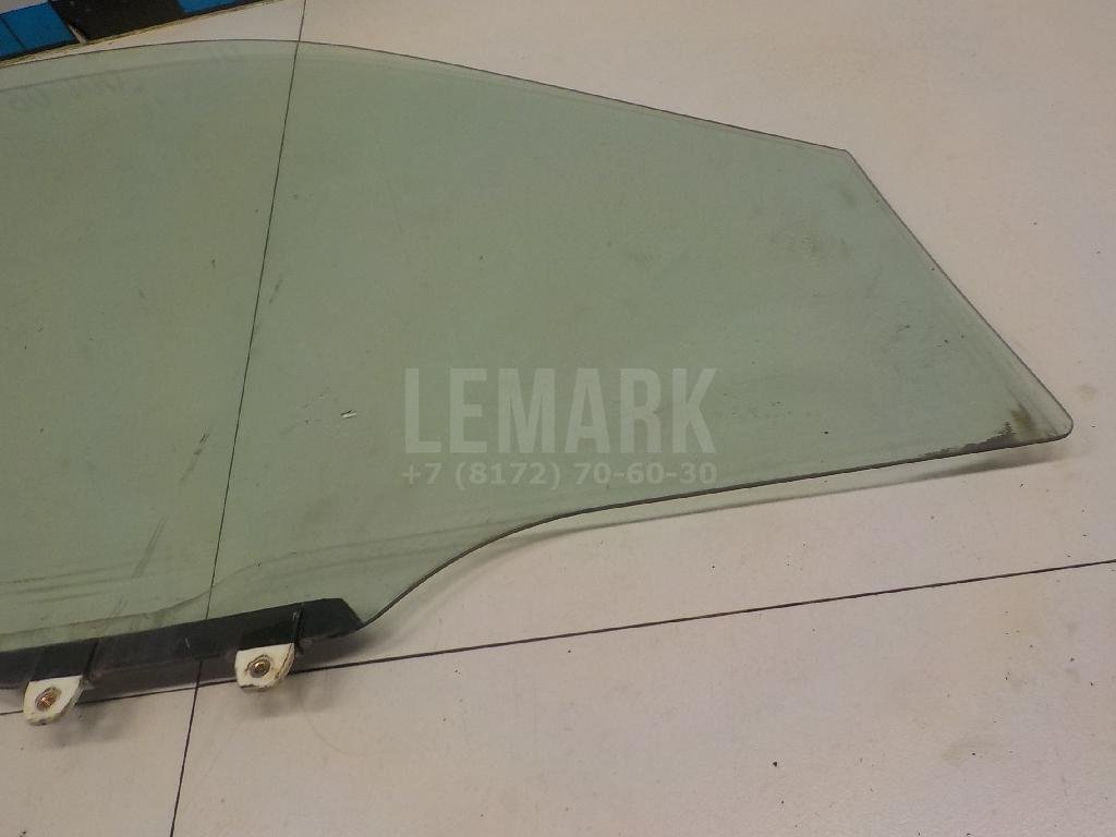 Стекло двери передней левой