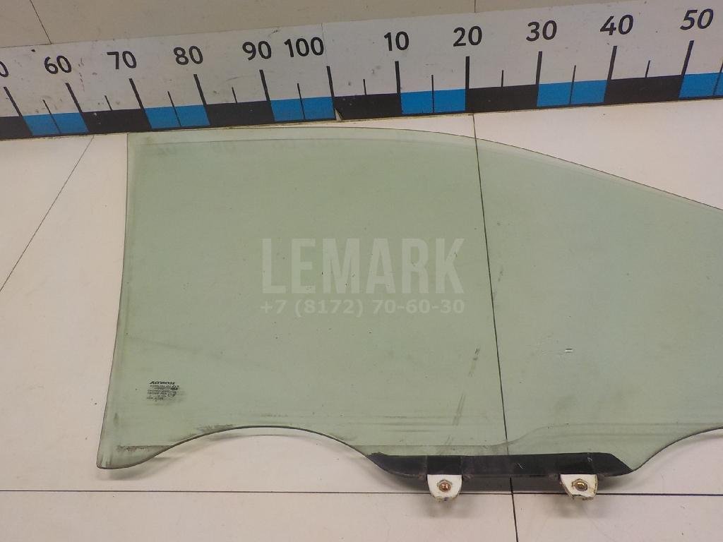 Стекло двери передней левой
