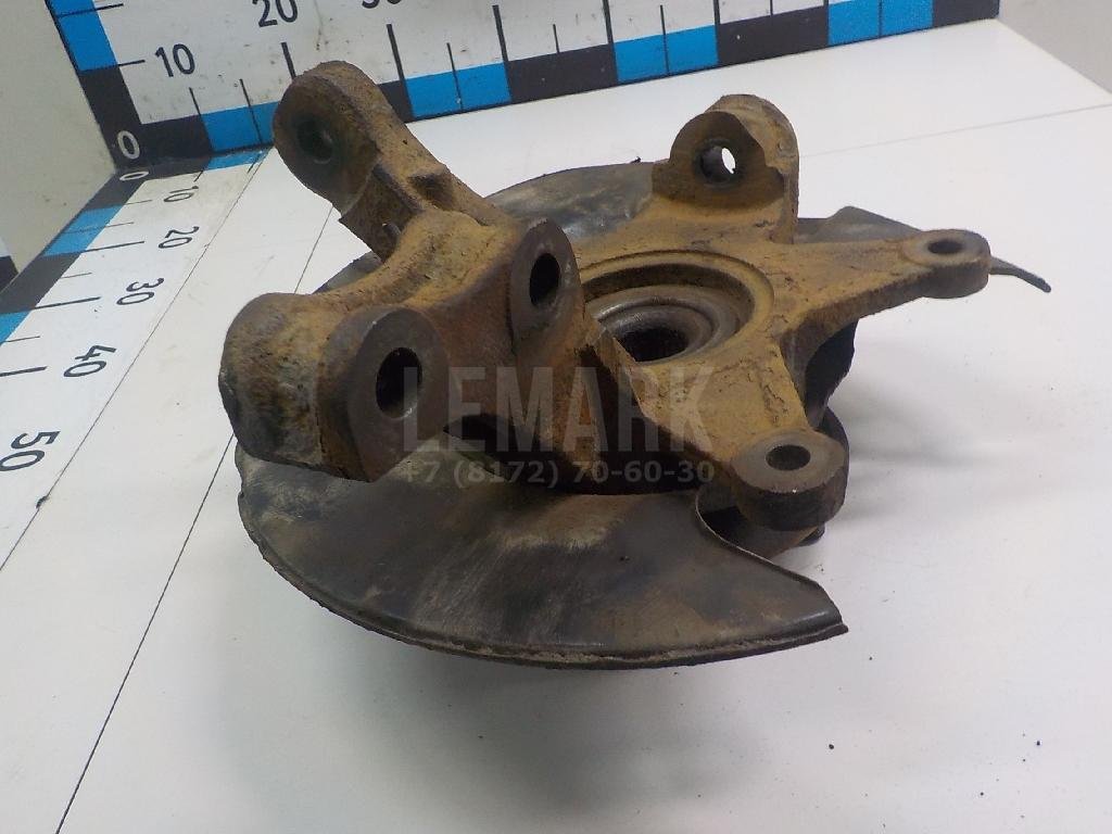 Кулак поворотный передний левый