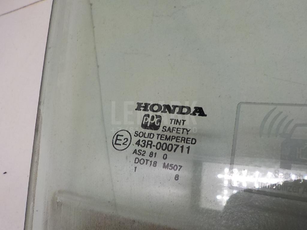 Стекло двери передней правой