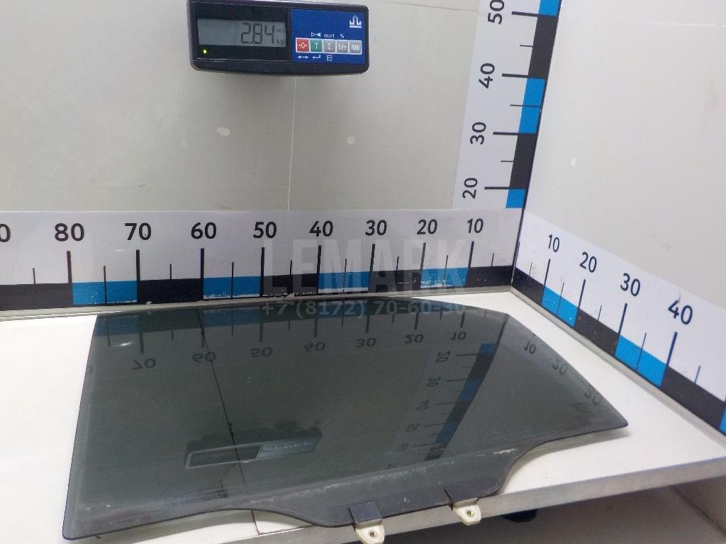 Стекло двери задней левой