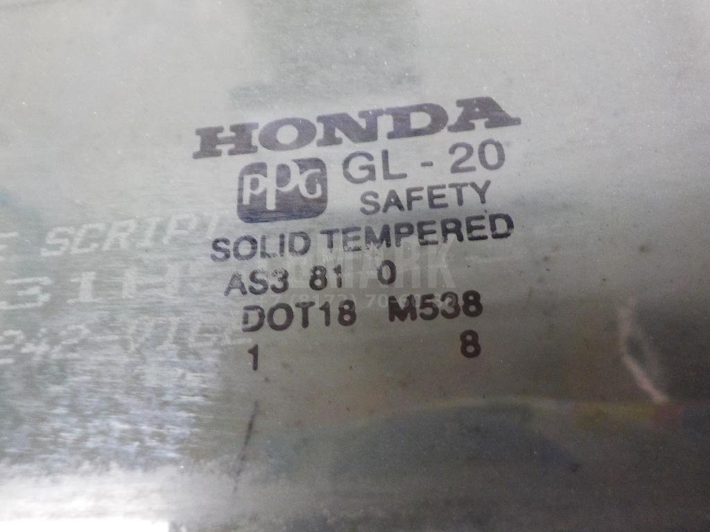 Стекло двери задней левой