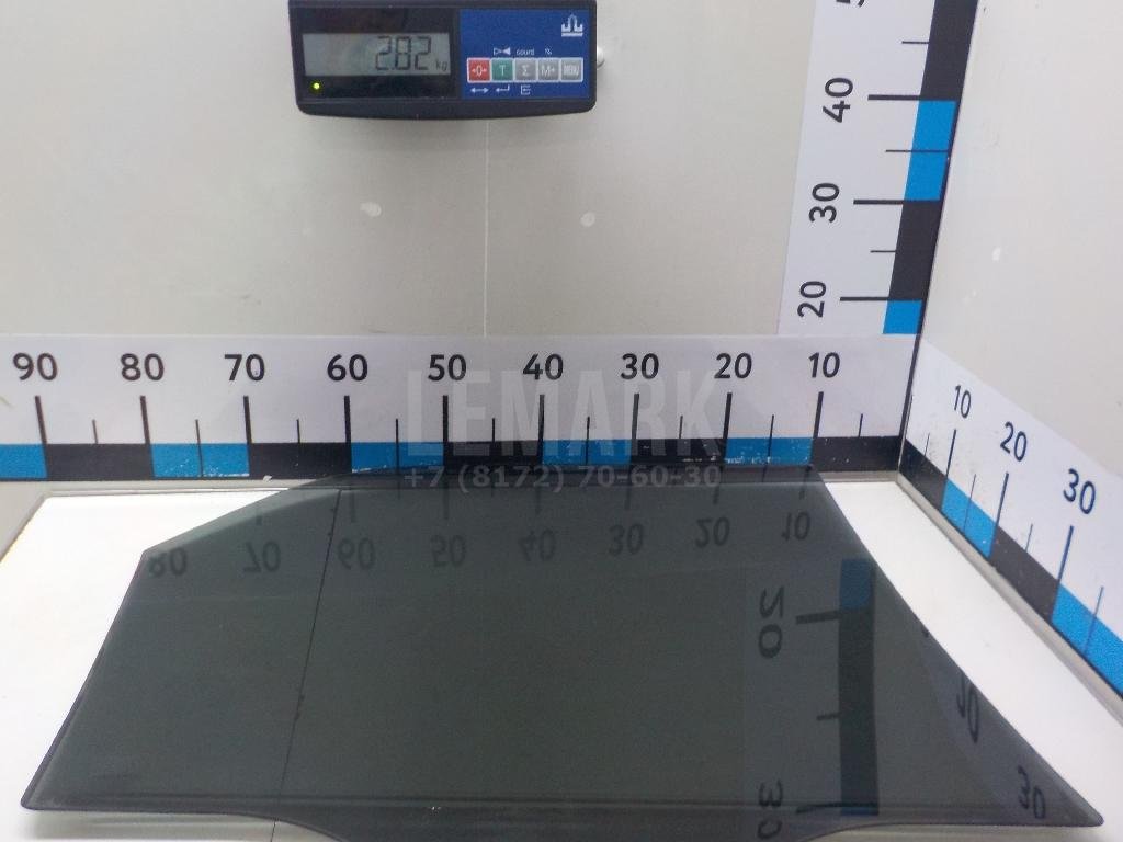 Стекло двери задней левой