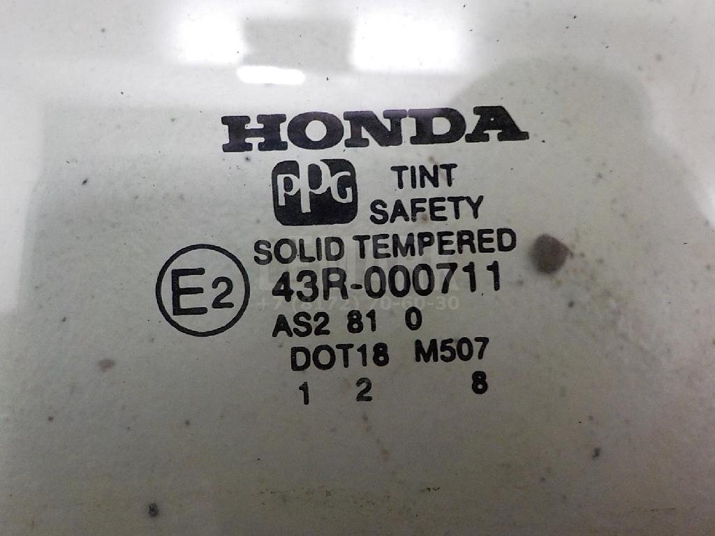 Стекло двери передней левой