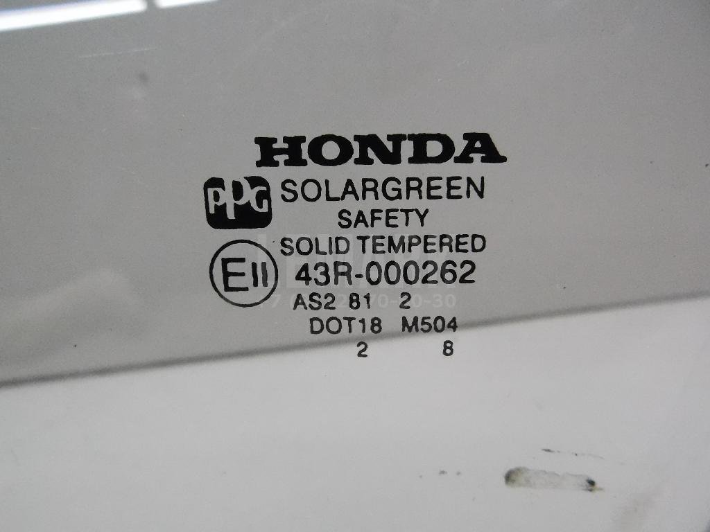 Стекло двери передней левой