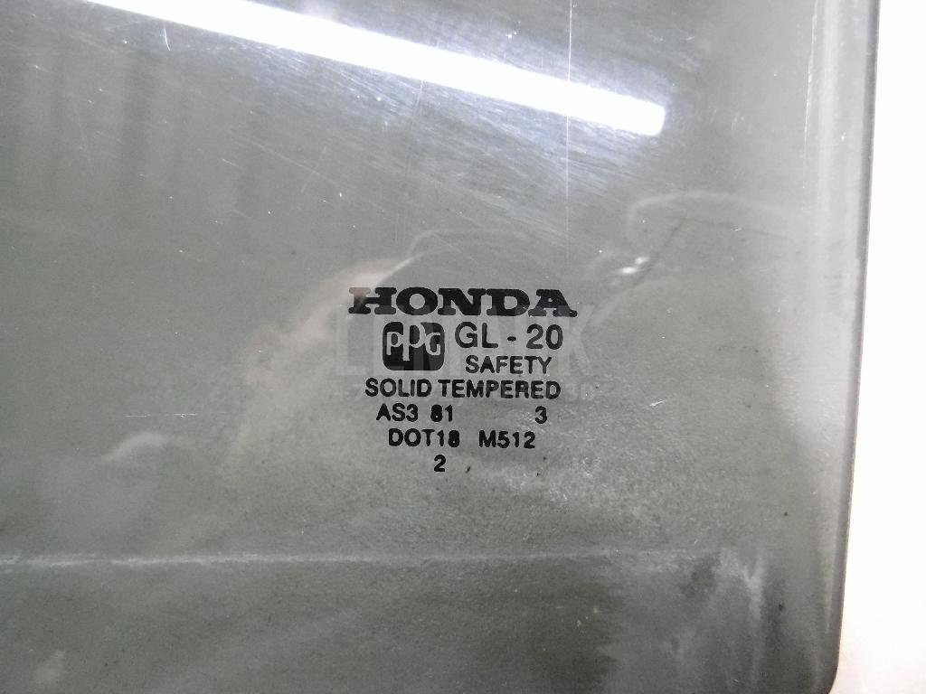 Стекло двери задней левой