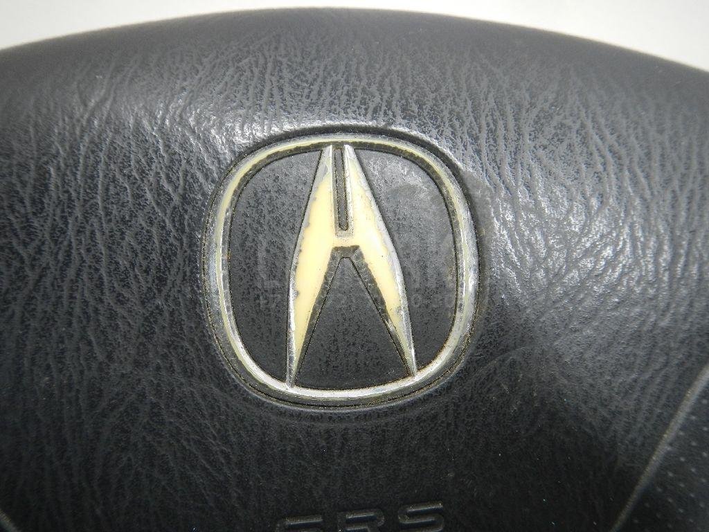 Подушка безопасности в рулевое колесо