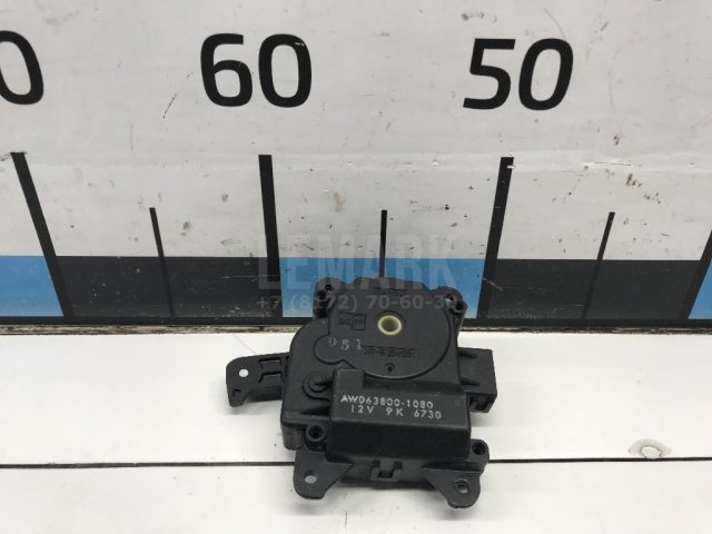 Моторчик заслонки отопителя