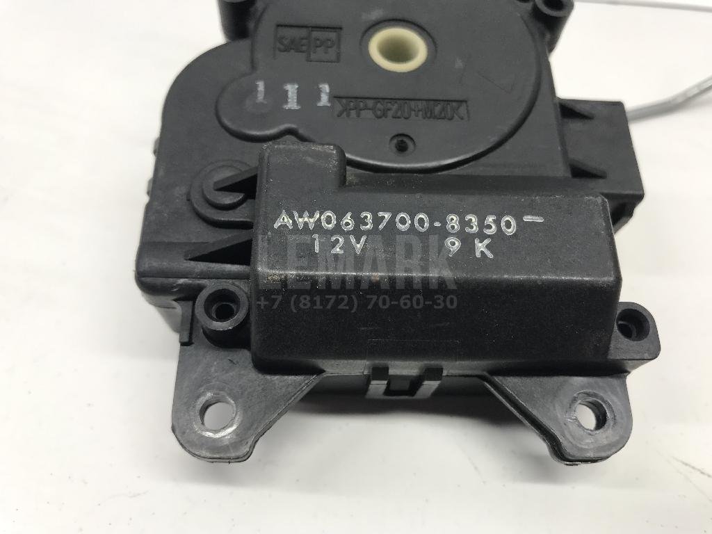 Моторчик заслонки отопителя