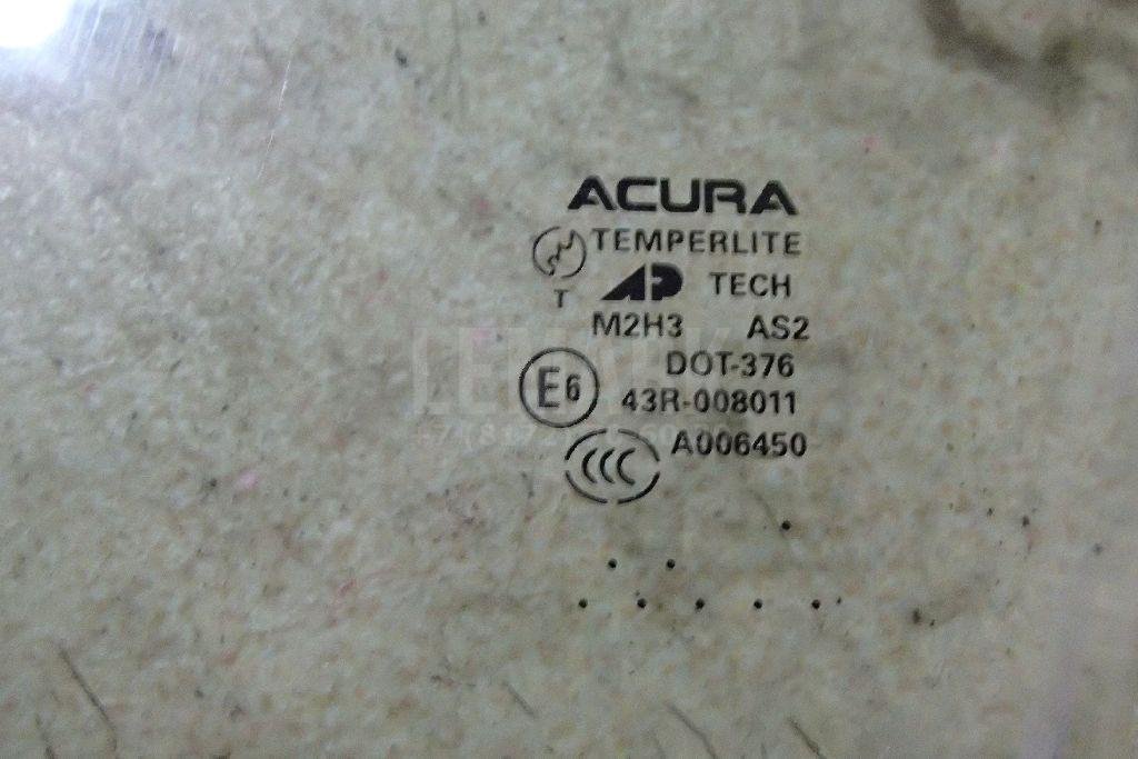 Стекло двери передней левой