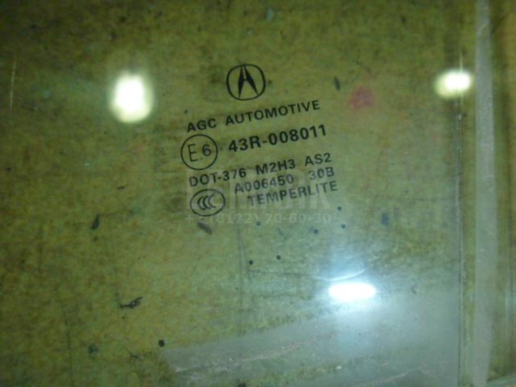 Стекло двери передней левой