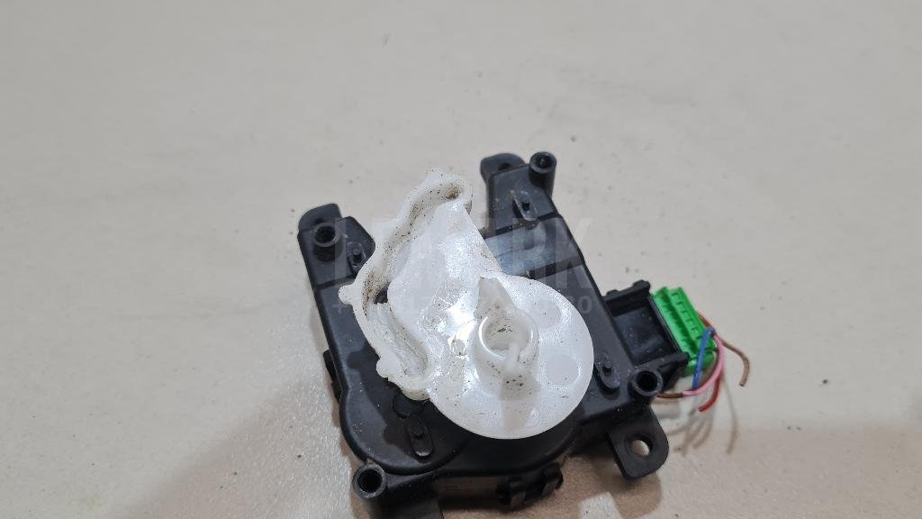 Моторчик заслонки отопителя