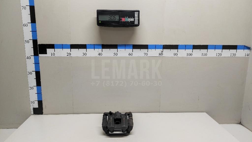 Суппорт тормозной задний левый