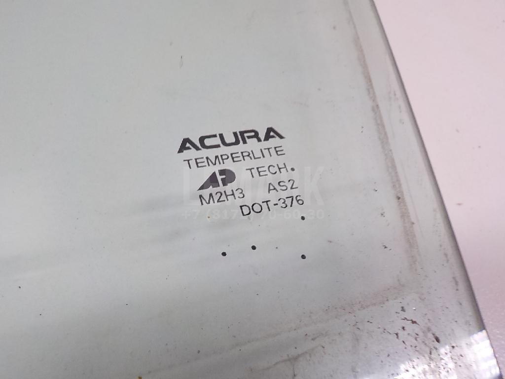 Стекло двери передней левой