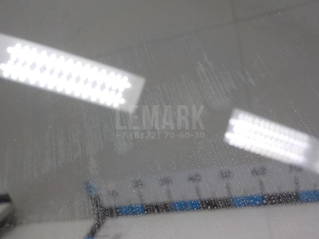 Стекло двери передней левой