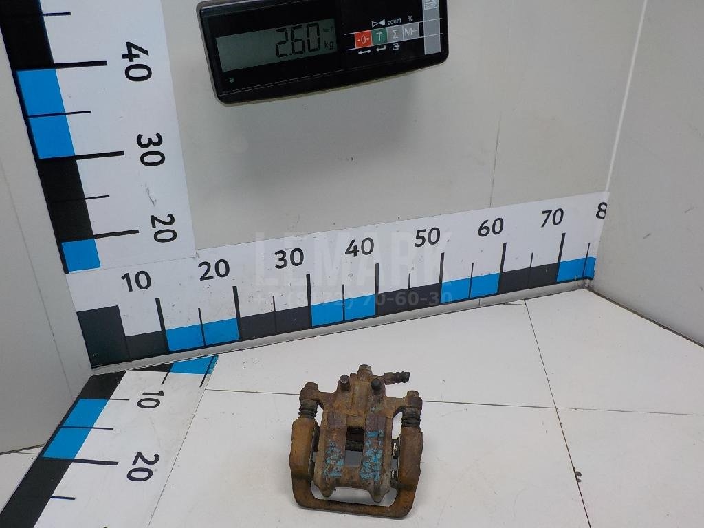 Суппорт тормозной задний правый