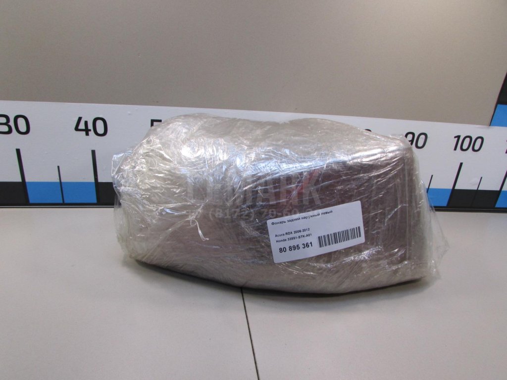 Фонарь задний наружный левый