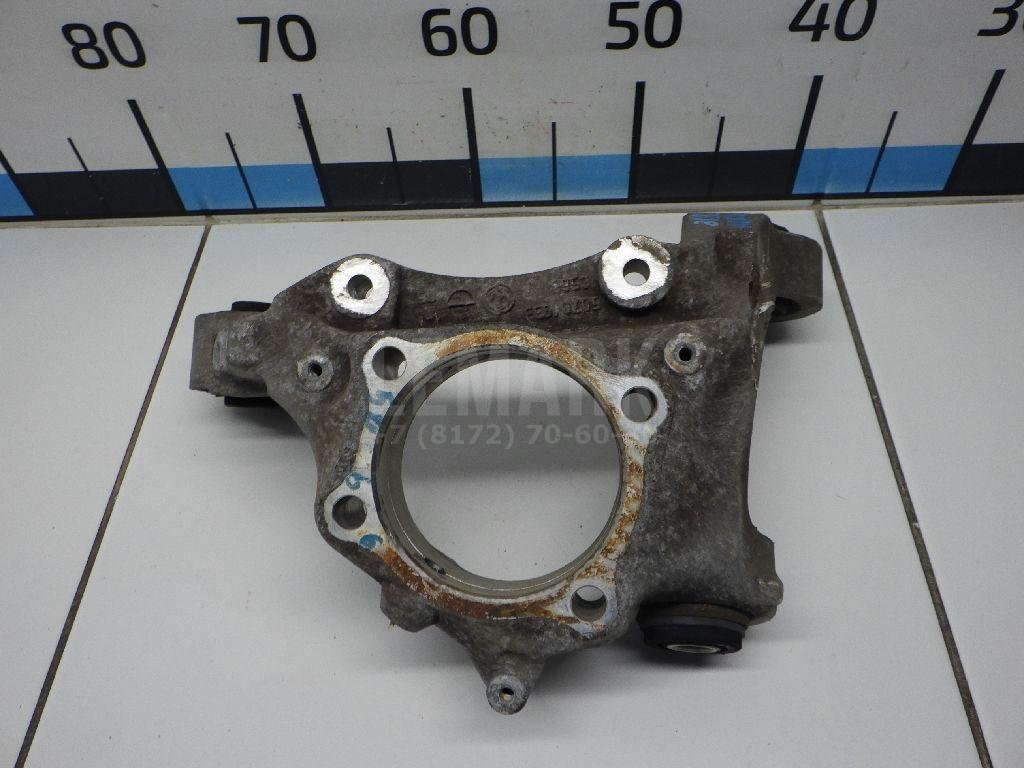 Кулак поворотный задний левый