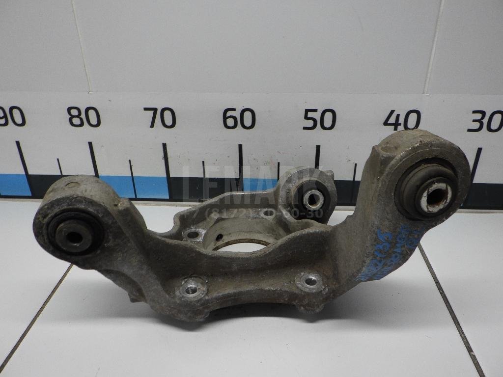 Кулак поворотный задний левый