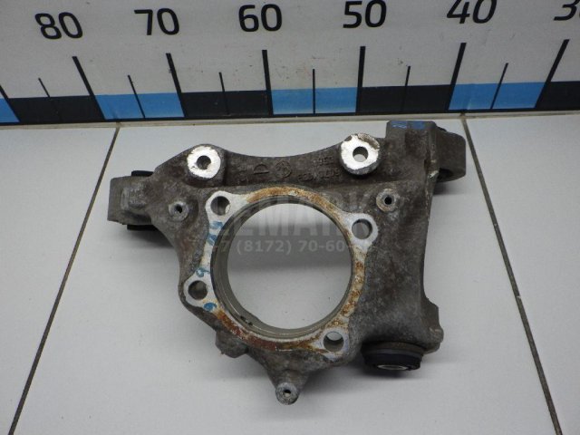 Кулак поворотный задний левый