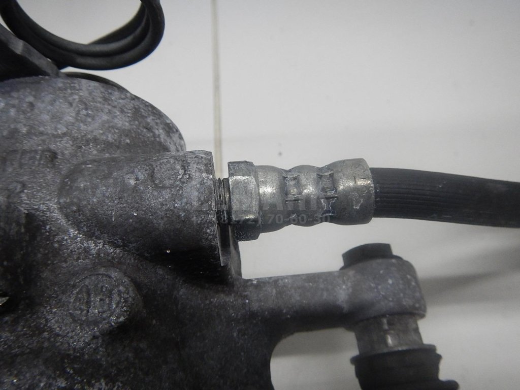 Суппорт тормозной задний левый