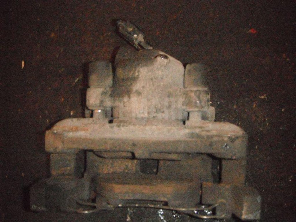 Суппорт тормозной передний левый