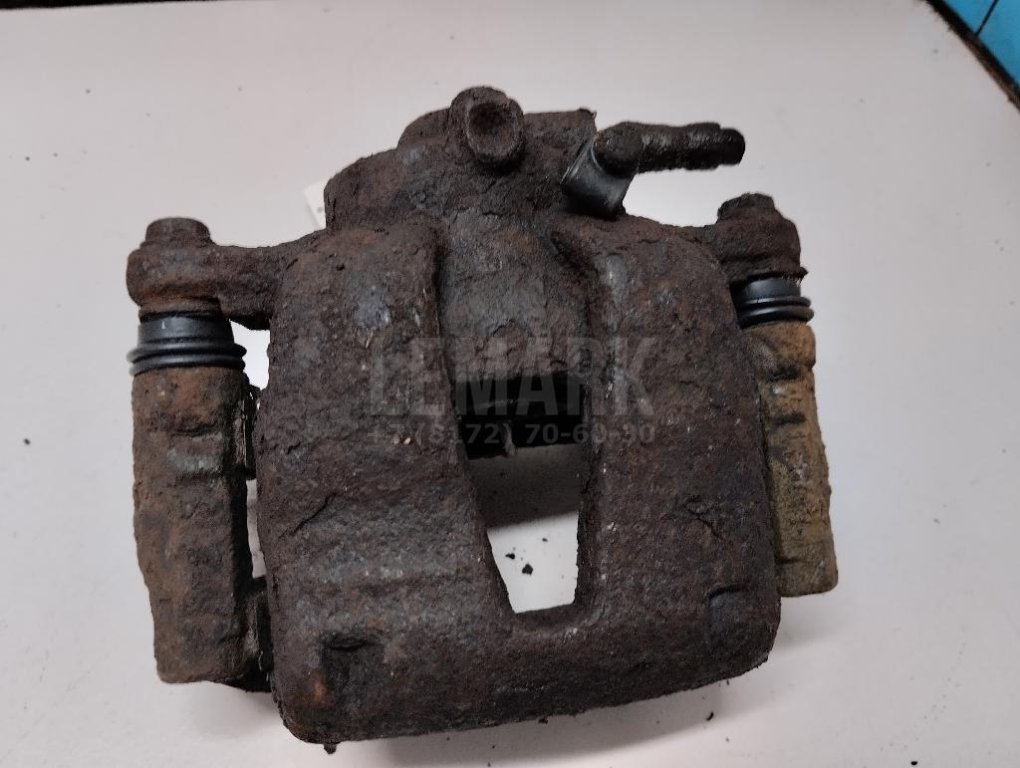 Суппорт тормозной передний левый