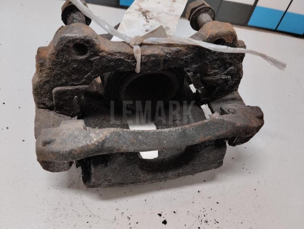 Суппорт тормозной передний левый