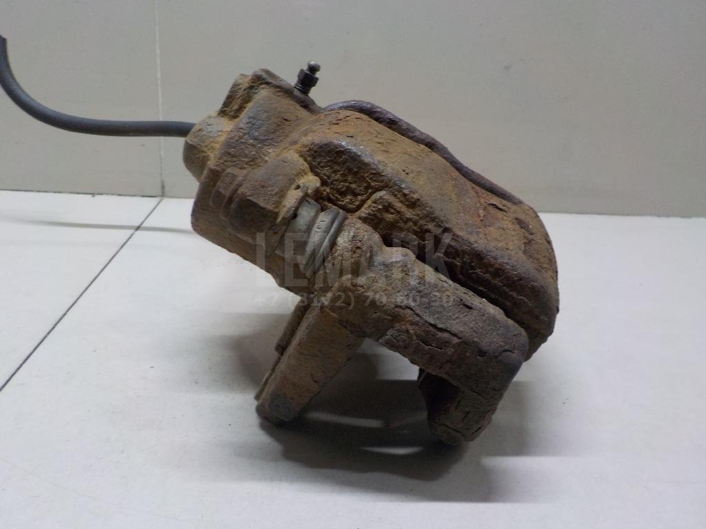 Суппорт тормозной передний левый