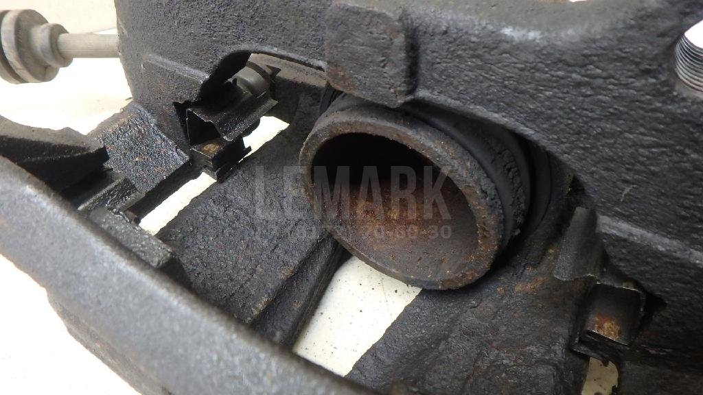 Суппорт тормозной передний левый