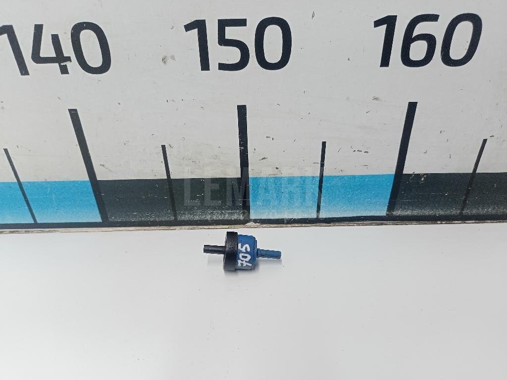 Клапан вакуумный