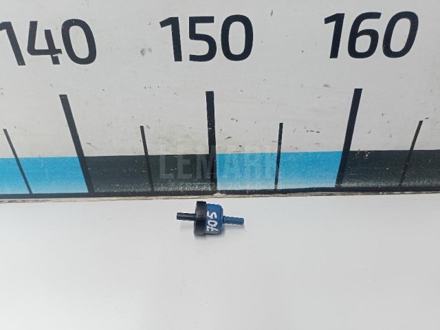 Клапан вакуумный