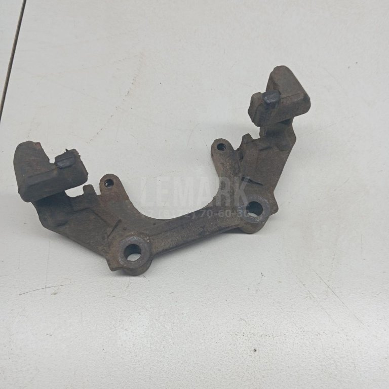 Скоба суппорта переднего