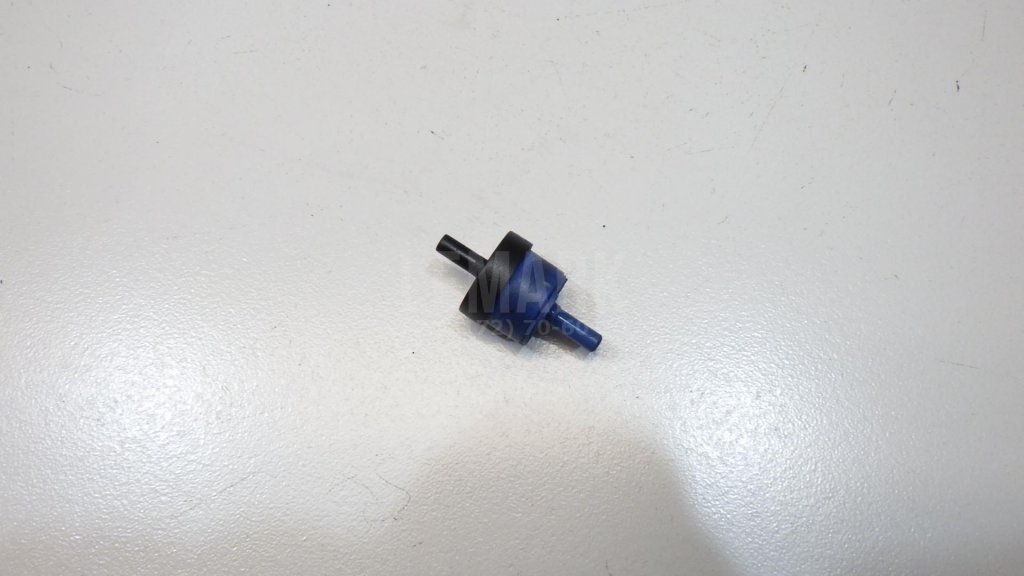 Клапан вакуумный