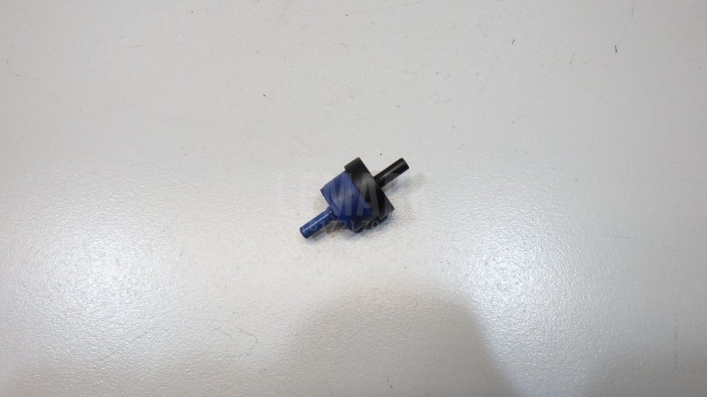 Клапан вакуумный