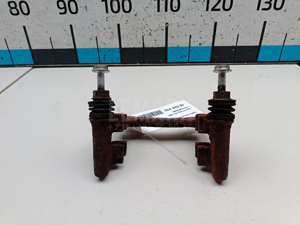 Скоба суппорта заднего