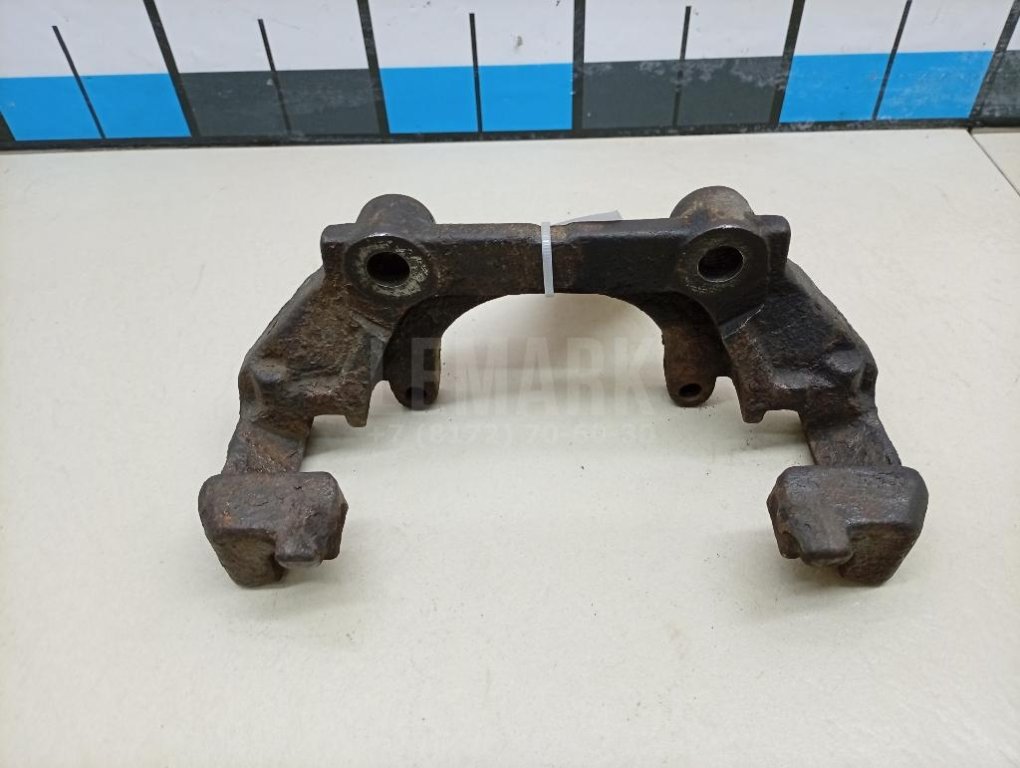 Скоба суппорта переднего