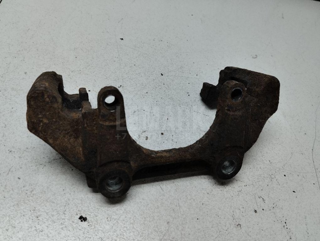 Скоба суппорта переднего