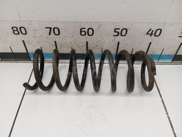 Пружина задняя