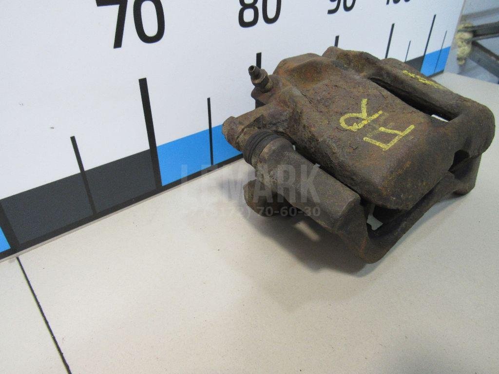 Суппорт тормозной передний