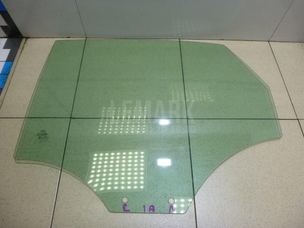 Стекло двери задней левой