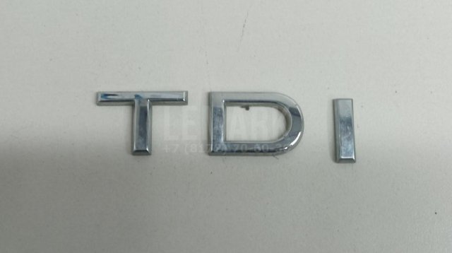 Эмблема на крышку багажника