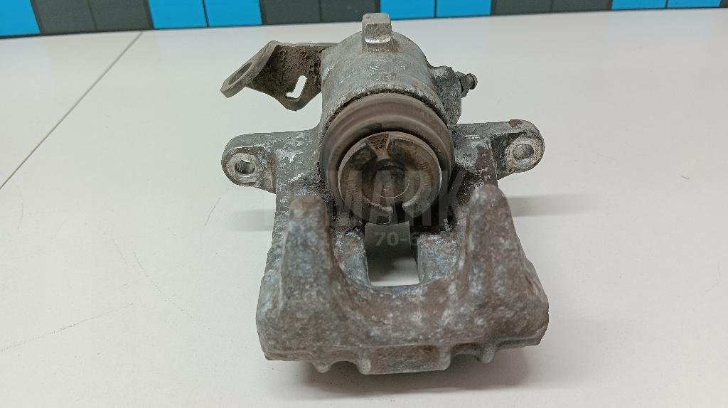 Суппорт тормозной задний левый