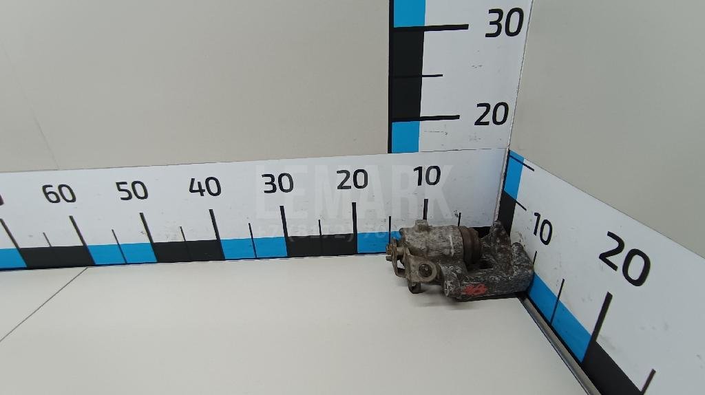 Суппорт тормозной задний левый