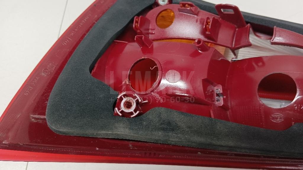 Фонарь задний левый