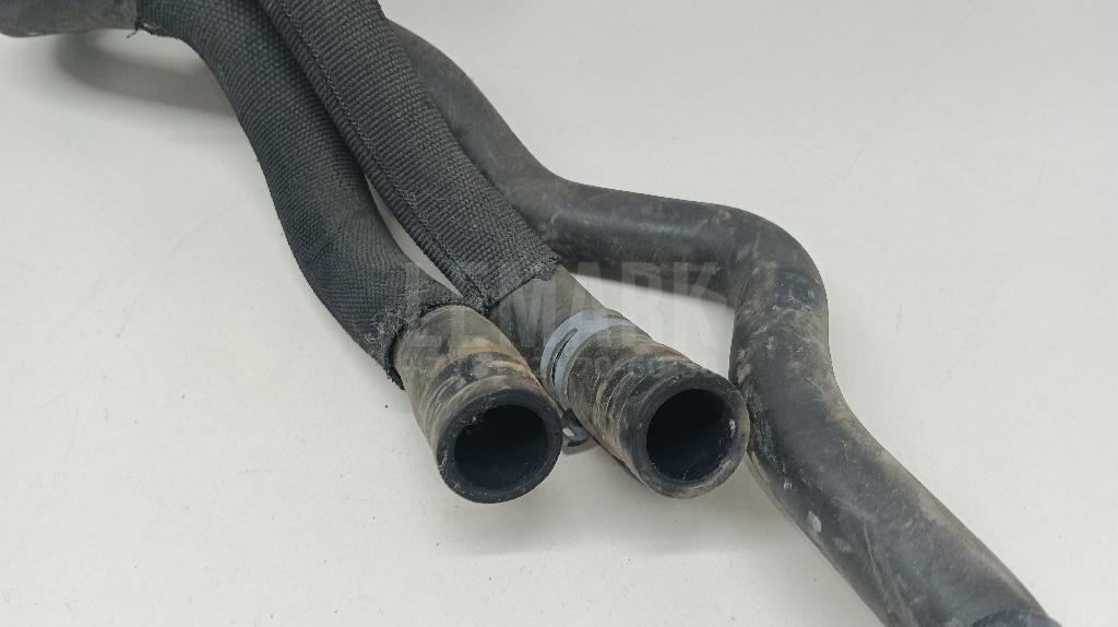 Патрубок отопителя