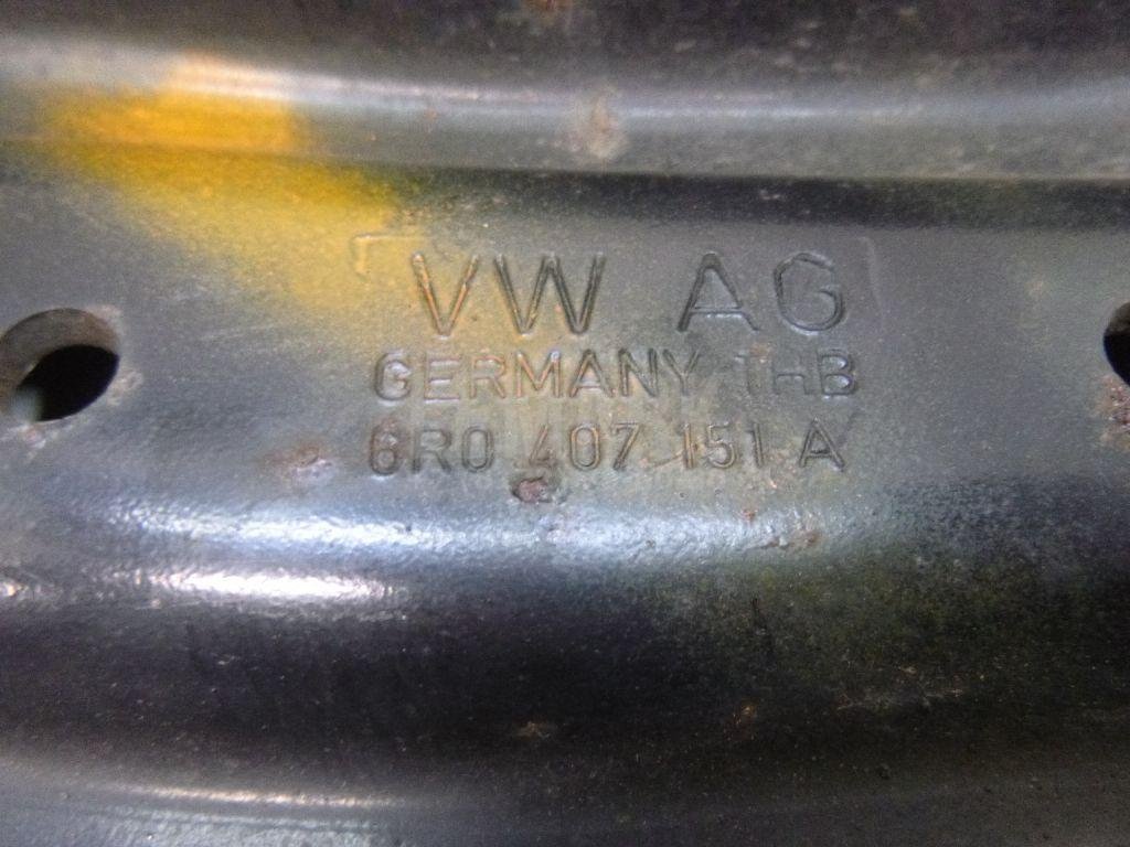 Рычаг передний левый