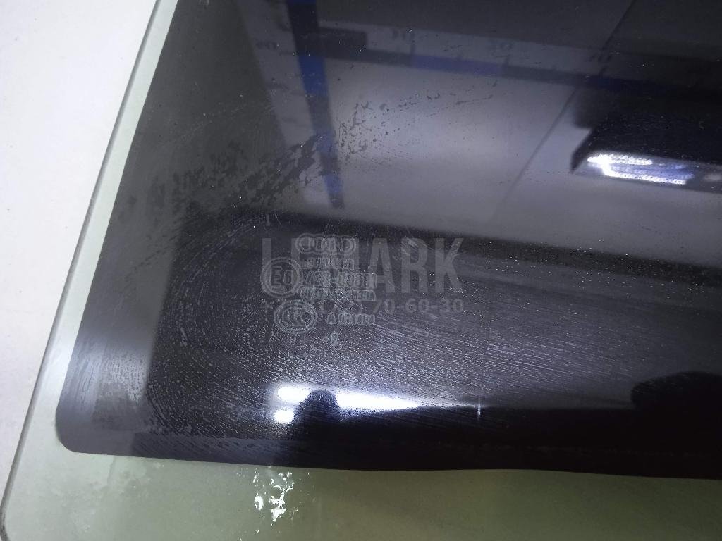 Стекло двери задней левой