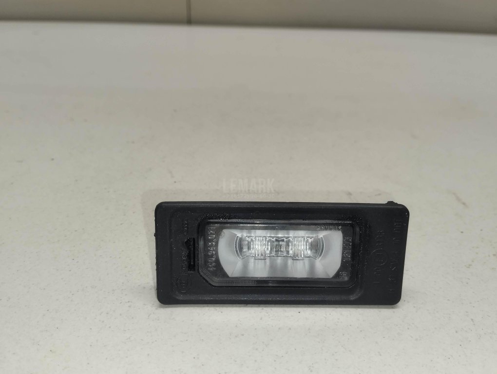 Фонарь подсветки номера